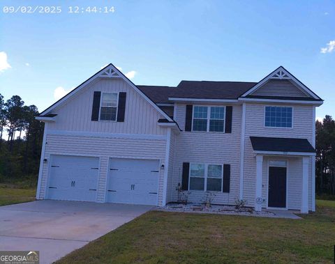 Photo of 102 Quarter Horse Run NE, Ludowici, GA 31316 (MLS # 10595958)