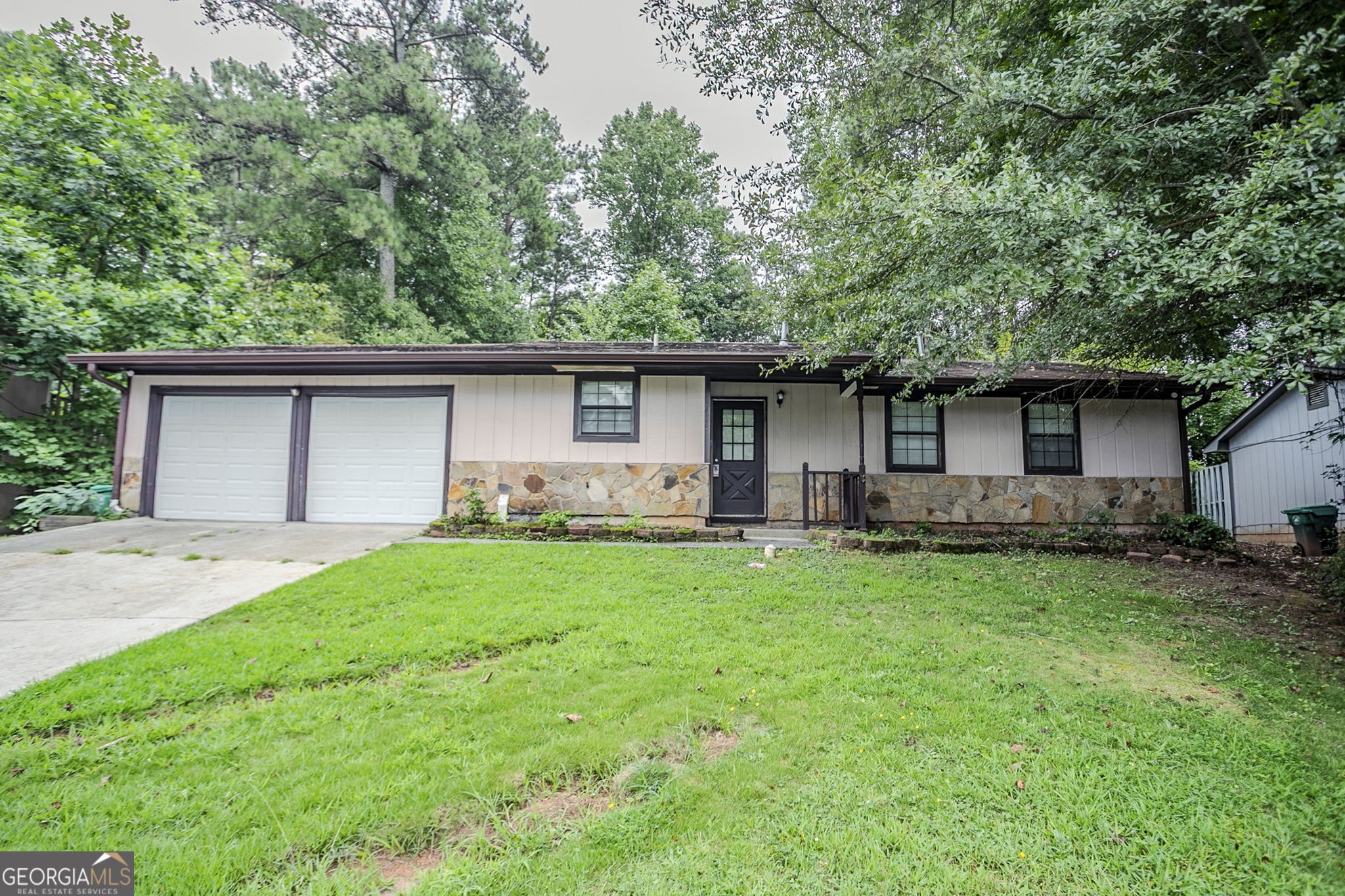 Charming ranch-style home in the quiet Leisure Valley community. This 3-bedroom, 2-bath residence features hardwood floors, a cozy family room with fireplace, and a screened back porch overlooking a private backyard. The single-level layout includes a comfortable primary suite with a tub/shower combo. With its nice size lot and convenient location near shopping, schools, and public transportation, this home offers excellent potential for both comfortable living and future updates. Cash/Hard Money only, no finance.