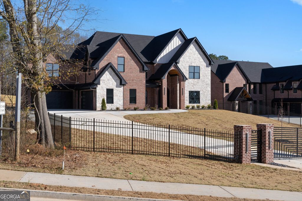 Photo of 409 Thunder Rd, Buford, GA 30518 (MLS # 10659792)