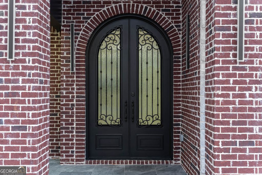 Photo of 409 Thunder Rd, Buford, GA 30518 (MLS # 10659792)