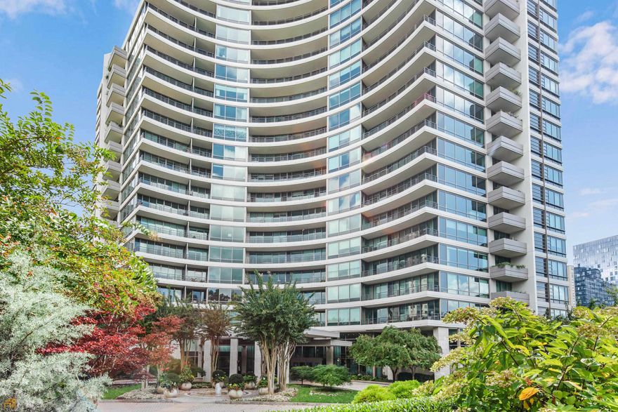 Live in luxury at the gated Park Regency! Stunning 2/2 with BONUS OFFICE! Open, bright floor plan w/ floor-to-ceiling windows. Gracious living & dining areas w/ stunning panoramic views. Watch the sunset from covered balcony that runs length of unit! Kitchen features sub-zero refrigerator, stainless appliances, granite counters & breakfast bar. Owner's suite has 2 walls of windows; bath w/ dual vanity & marble counters, large soaking tub,  & glass shower; huge walk-in closet. 2nd bedroom has access to balcony & private bathroom. Additional half bath. Sep laundry room. Office has its own private balcony area. Personal storage unit. Two deeded garage spaces. The amenities in this building are amazing! Concierge, valet parking for residents and guests, wine cellar &  tasting room, fitness center, pool, huge meeting room w/ kitchen, gorgeous rooftop deck w/ fireplace, guest suites, and dog park. Close to everything wonderful about Buckhead. Great schools! Convenient to 400!