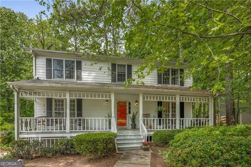 Lovely home located in the heart of East Cobb has it all featuring a rocking chair front porch.  Open foyer leads to formal dining, living and family rooms.  Family room features wainscoting, warm brick fireplace and access to the rear deck. Spacious kitchen with updated butcher block counters, stainless steel appliances and updated electric cooktop. Separate laundry room and door to rear deck.  Upstairs features 4 bedrooms with 2 full baths. Master bedroom with walk in closet.  Two car side entry garage with partial unfinished basement with loads of storage.  Home is located within walking distance to the community amenities.  Brookcliff features an active HOA, pool, tennis, playground and acres of greenspace with creek, trails and more.  Top 10 East Cobb schools and easy access to shopping. Several million dollar plus homes in the neighborhood.