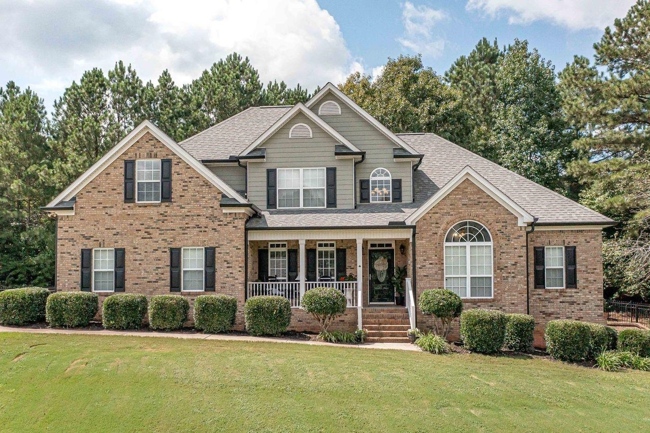 Prepare to be impressed the moment that you walk into this fabulous 5 bedroom, 3 bath, two-story home in desirable community with great schools. Some features include gleaming hardwoods, master on main with large walk-in closet, guest bedroom on main, formal dining room, eat-in kithen with 42" custom cabinets and corian counter tops, 3 bedrooms upstairs. Finished family room/media room in the basement. Additonal stoage areas in basement with boat door. Screened porch with composite decking, additonal sun deck and fenced yard. Home is situated on 1.04 acres.