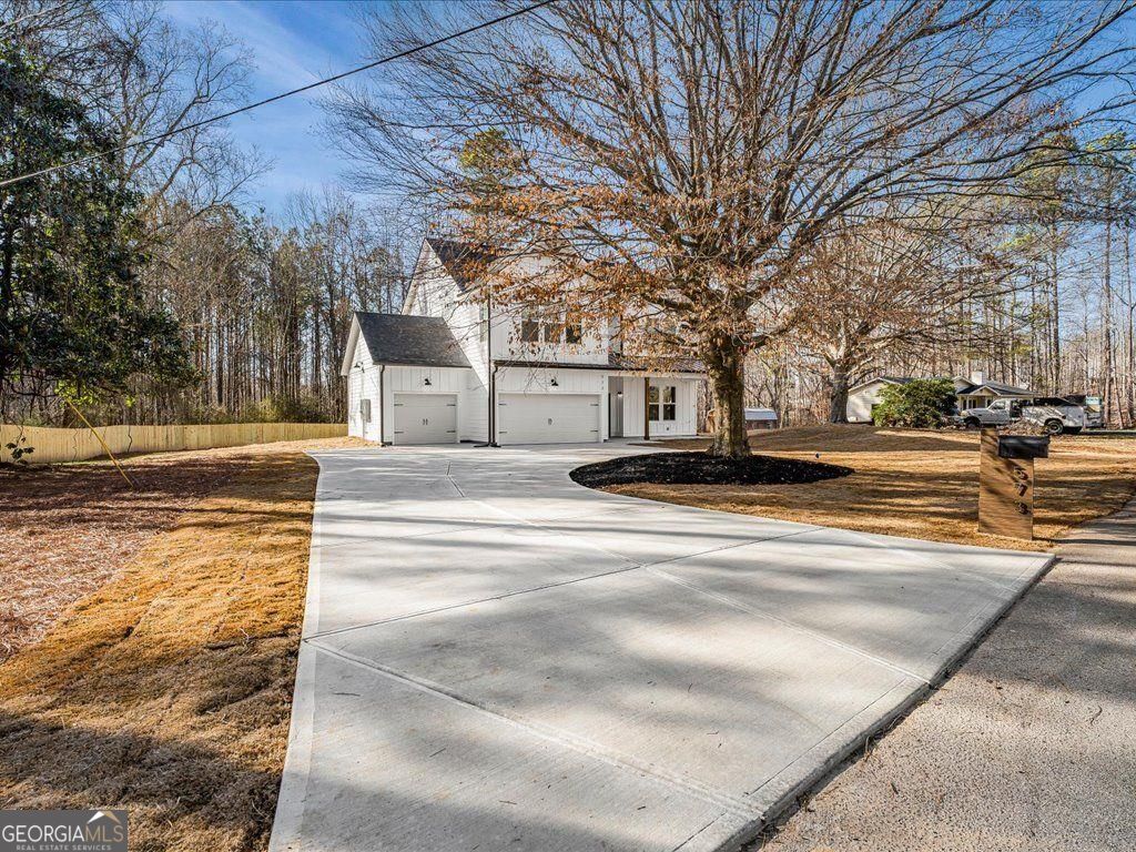 Photo of 573 Coach Bobby Dodd Road, Dallas, GA 30132 (MLS # 10691502)
