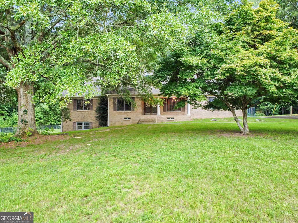 Photo of 2195 Temple Johnson Road, Snellville, GA 30078 (MLS # 10822288)