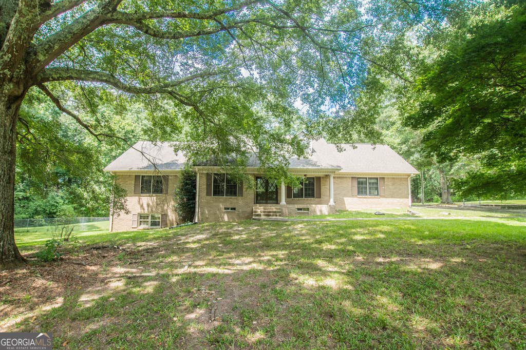 Photo of 2195 Temple Johnson Road, Snellville, GA 30078 (MLS # 10822288)