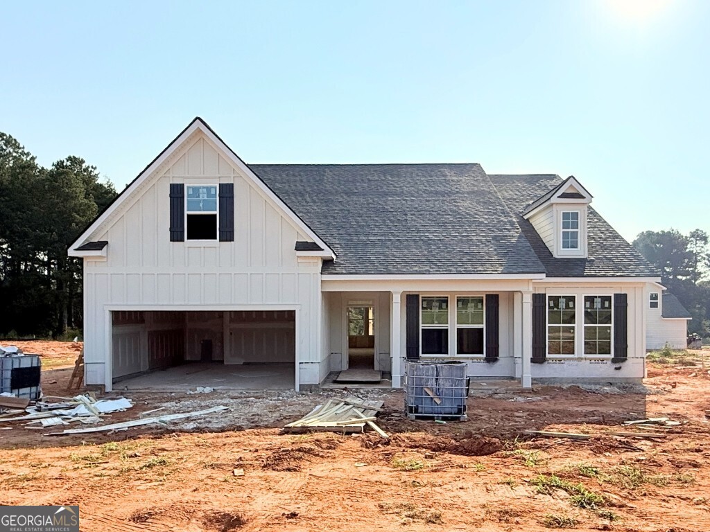 The Blackburn plan built by My Home Communities! This beautiful 4-bed, 3-bath ranch on a private 0.61-acre corner homesite in Winder offers the perfect mix of comfort and convenience, just minutes to Athens with easy access to US-29. Enjoy an open-concept layout with quartz countertops, LVP flooring, stainless steel appliances, 36" soft-close cabinets, electric fireplace, and more throughout the main level. The spacious primary suite features a double-tray ceiling, tiled shower, linen closet, dual vanity, and large walk-in closet. Two secondary bedrooms, a full bath, and a laundry room are also on the main floor, while the upstairs bonus room/4th bedroom includes its own full bath, perfect for guests or a flex space. Estimated completion October 2025. Contact us TODAY to learn about our Rates Starting as Low as 1.99%* with use of Seller's Preferred Lender! *Secondary photos and Matterport tour are an example of the floor plan and not of the actual listing*