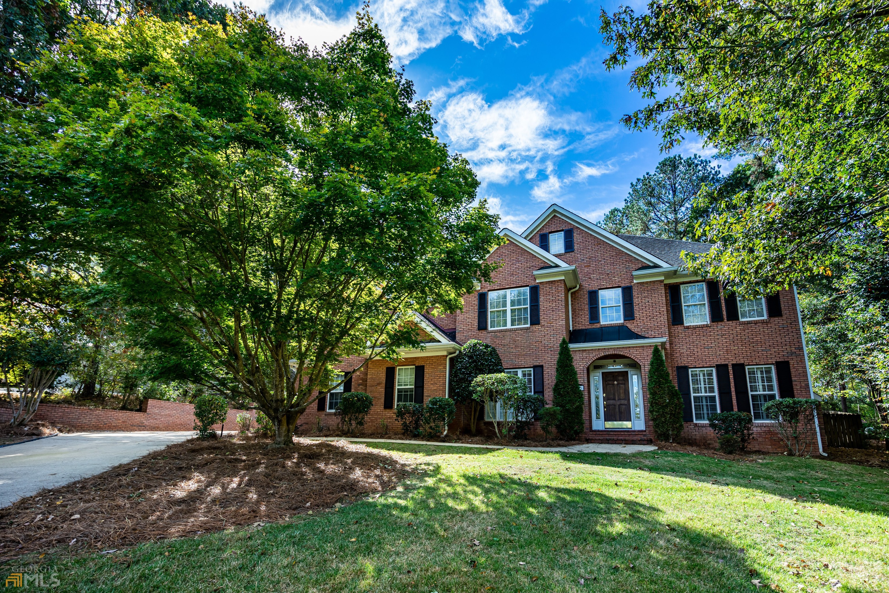 Custom built brick home with many upgrades. Hardwood flooring, open updated kitchen with stainless appliances, pantry & island. Family Room, Den and bonus room. Dining Room, double staircase, master suite upstairs offers garden tub, separate shower and double vanity. 2 car garage attached with additional 2 car garage detached with storage above. back patio with private back yard Hollis Hand School Zone Easy access to West Point Lake Vacant show anytime Community Pool Membership is optional $375 per year