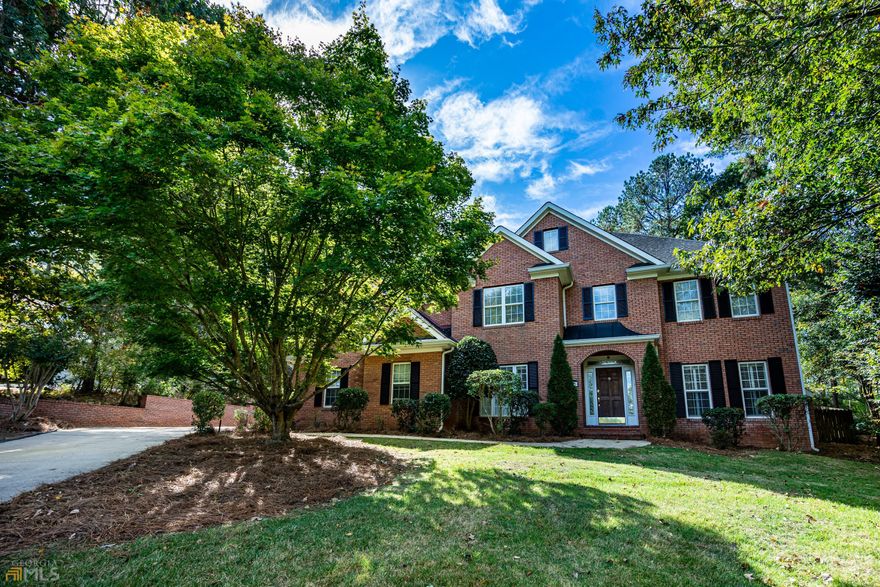Custom built brick home with many upgrades. Hardwood flooring, open updated kitchen with stainless appliances, pantry & island. Family Room, Den and bonus room. Dining Room, double staircase, master suite upstairs offers garden tub, separate shower and double vanity. 2 car garage attached with additional 2 car garage detached with storage above. back patio with private back yard  Hollis Hand School Zone    Easy access to West Point Lake   Vacant show anytime  Community Pool Membership is optional $375 per year