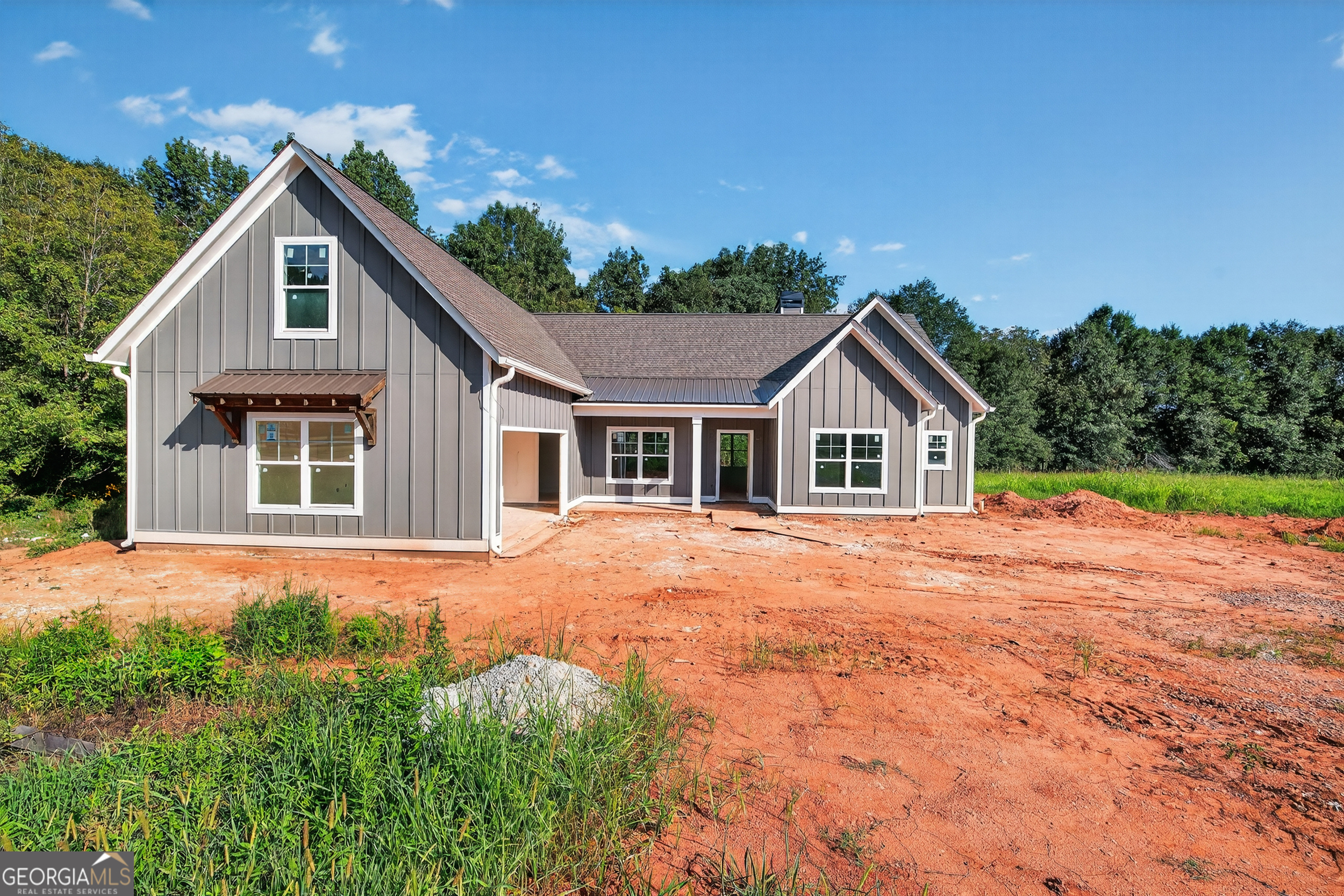 NEW CONSTRUCTION ON 2 ACRES IN HISTORIC DOWNTOWN BOSTWICK IN MORGAN COUNTY!! This charming 3 Bed/2 Bath + Bonus Room (or 4th Bedroom) is in a fantastic location! The Dawson plan built by award winning JW York Homes, features an open kitchen concept with soaring vaulted ceilings throughout the kitchen/living room creating a very spacious entertaining area. This plan also features a mudroom area off the garage, formal dining room, and fabulous kitchen with huge center island. This new build includes kitchen cabinetry in Snow (white), gorgeous quartz and granite countertops throughout, tiled master bathroom floor and shower walls, full hardieboard exterior siding, front & back covered porches, extensive trim package, trending matte black light fixtures and cabinet hardware, wood burning fireplace with tile surround, and a Whirlpool stainless appliance package. All of these dynamic appointments are perfectly enveloped on a private 2 acres! No HOA!