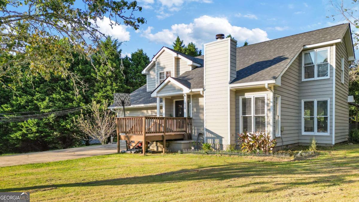 Welcome to this charming 3BR/2.5BA craftsman style home nestled on a spacious 0.74 acre corner lot in the quiet Huckleberry Hills community. This well-maintained residence features an open-concept floor plan with high ceilings, a cozy fireplace in the family room, and a kitchen that overlooks the breakfast area and living space perfect for everyday living and entertaining. Enjoy outdoor living on the oversized rear deck overlooking a large, fenced backyard. Primary suite on main level with two additional bedrooms upstairs. Fresh paint, modern laminate flooring, and updated systems. Conveniently located near schools, shopping, and Hwy 316. Don't miss this move-in ready gem in Auburn!