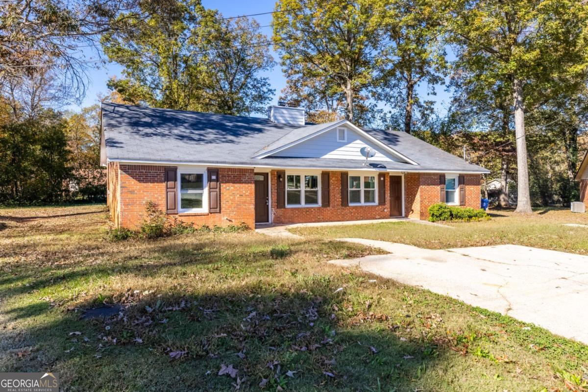 Excellent investment opportunity! This income-producing property features long-term tenants and a solid 4-sided brick building. Each spacious unit offers 2 bedrooms and 2 baths. With no HOA fees and strong cash flow, this property is a great addition to any portfolio. Please do not disturb tenants. Conveniently located near Hwy 316 and downtown Lawrenceville, with easy access to hospitals, restaurants, schools, parks, and shopping.