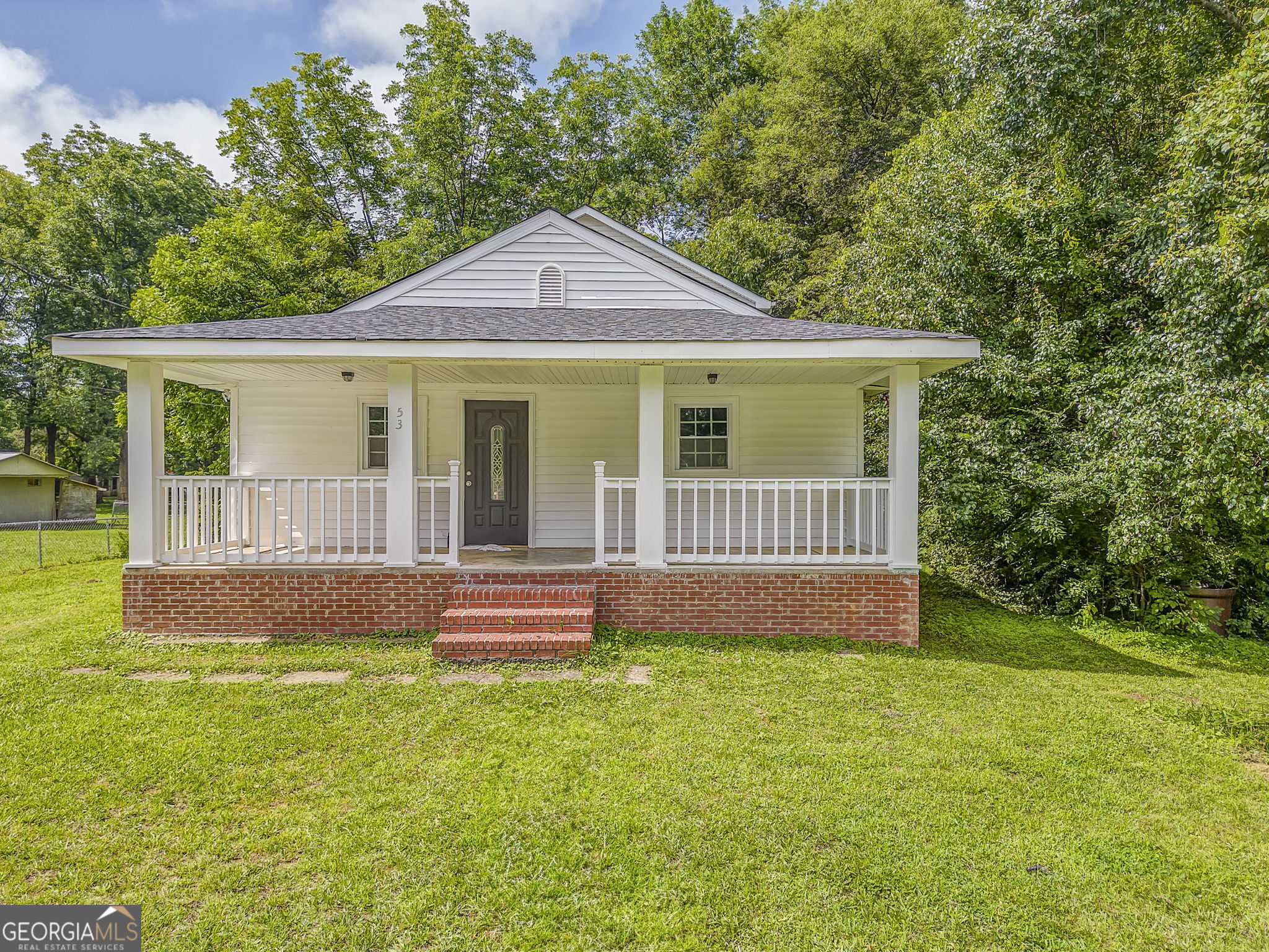Welcome to 53 Knight Dr - a recently renovated 3 bedroom, 1 bathroom home on 1.81 acres in a quiet, established neighborhood within walking distance of Cedar Valley Golf Course. Updates include new flooring, a modernized kitchen, refreshed bathroom, new paint throughout, updated fixtures, and a brand new roof installed in May 2025. Enjoy the spacious rocking chair front porch, a large backyard perfect for gatherings or outdoor activities, and a convenient storage building for tools or equipment. Whether you're looking for a peaceful place to call home or a property close to town and recreation, this move-in ready home offers it all.