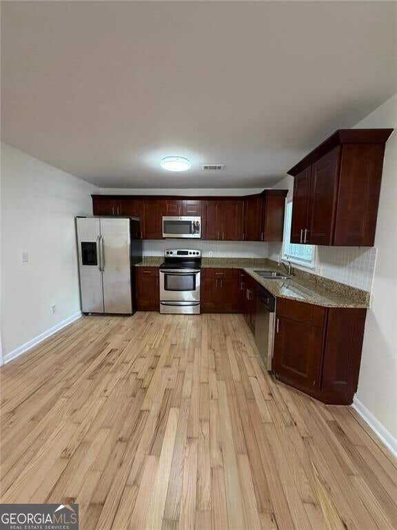 Photo of 637 Parkdale Drive, Scottdale, GA 30079 (MLS # 10832937)