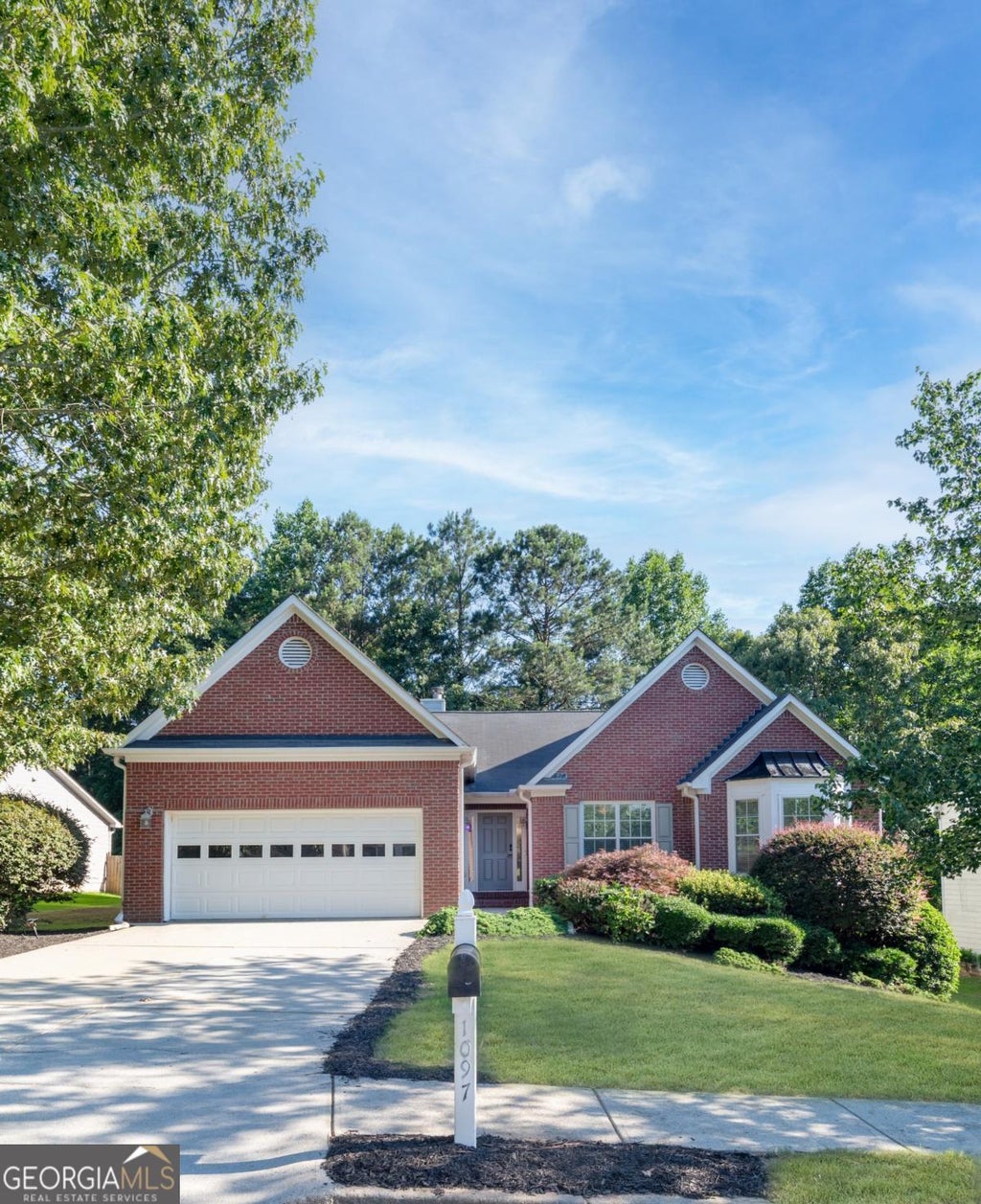 Photo of 1097 Quiet Waters Lane, Lawrenceville, GA 30045 (MLS # 10781808)