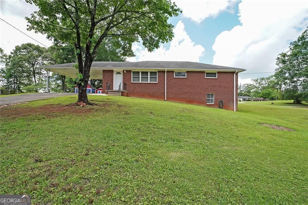 Welcome home to 629 Birchwood Rd in Marietta, GA. So many updates in this property. New paint, New light fixtures, new fans. New dishwasher, new finished hardwood floors and newer water heater. Meander to the basement level and check out the abundant square footage for a possible 2 additional bedrooms and family room. Huge corner lot with two outdoor sheds/workrooms!