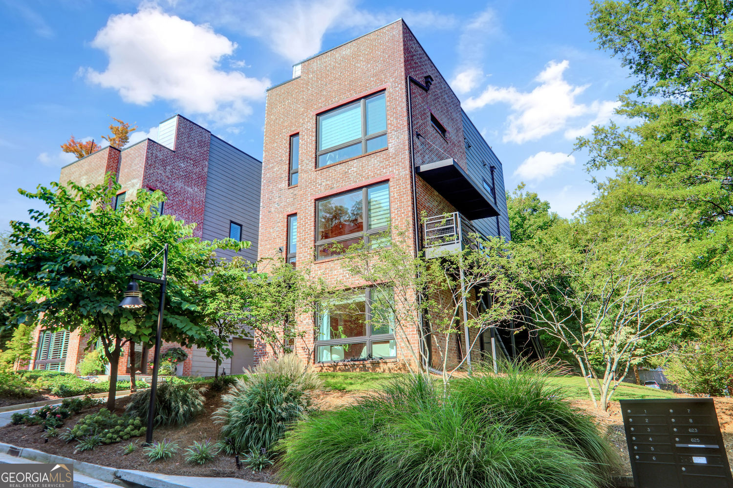 623 Irwin Street, N.E. The perfect combination of Location, Style and Comfort! Experience the blend of urban excitement and refined living in this fully furnished, contemporary, detached 4-story townhouse. Living in Water Tower Stacks - Old Fourth Ward, one of Atlanta's most dynamic and walkable neighborhoods, imagine the convenience of being steps away from the Beltline, Krog Street Market, Old Fourth Ward Park, Ponce City Market and near premier shopping, dining, and entertainment hotspots. Enjoy easy access to the interstate or take a walk to mid-town or downtown Atlanta. Offering over 2400 square feet of living space, the open and airy floor plan has plenty of natural light and is designed for modern living and entertainment. The terrace level main entry is bright and provides easy access to an attached two car garage. On the second level, the open concept design seamlessly connects the kitchen, dining and living space. The kitchen boasts modern cabinetry, an island, quartz countertops and top of the line finishes.Enjoy grilling or relaxing on the adjoining patio. There are beautiful hardwood floors throughout. This beautifully furnished residence features 3 bedrooms and 3.5 bathrooms. Located on the 3rd floor, the primary suite has double vanities, an oversized tiled shower and a customized walk-in closet. The second bedroom has an en suite connection to a hall bath and a large closet. Located on the terrace level, the third bedroom, connects to a full bath, and provides privacy for a roommate or a guest. Relax and entertain on the private fourth floor rooftop patio and enjoy the Atlanta sunset and skyline views while gathered around the fire pit. This home also includes access to additional common gardens and outdoor spaces. Modern conveniences include central AC and heating, washer and dryer, blinds draperies, black out blinds and key code entry. Schedule an appointment today to taste the epitome of luxury living in an unparalleled location!!!!