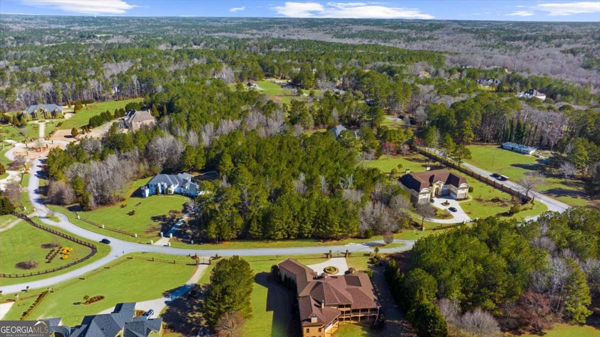 An exceptional opportunity awaits in the highly sought-after Wellington Lake Estates! This beautiful 2.45-acre lot offers the perfect setting to create your custom-built dream home! Nestled among a community of exquisite, one-of-a-kind homes, this property provides ample space and privacy while being just moments away from local amenities. Surrounded by natural beauty and tranquility, this lot is ideal for those seeking a peaceful retreat or a place to entertain family and friends. The serene environment offers endless possibilities for designing your ideal home and outdoor living spaces. DonCOt miss the chance to own this incredible piece of land in a community known for its luxury and uniqueness. Build the home youCOve always dreamed of in Wellington Lake Estates today!