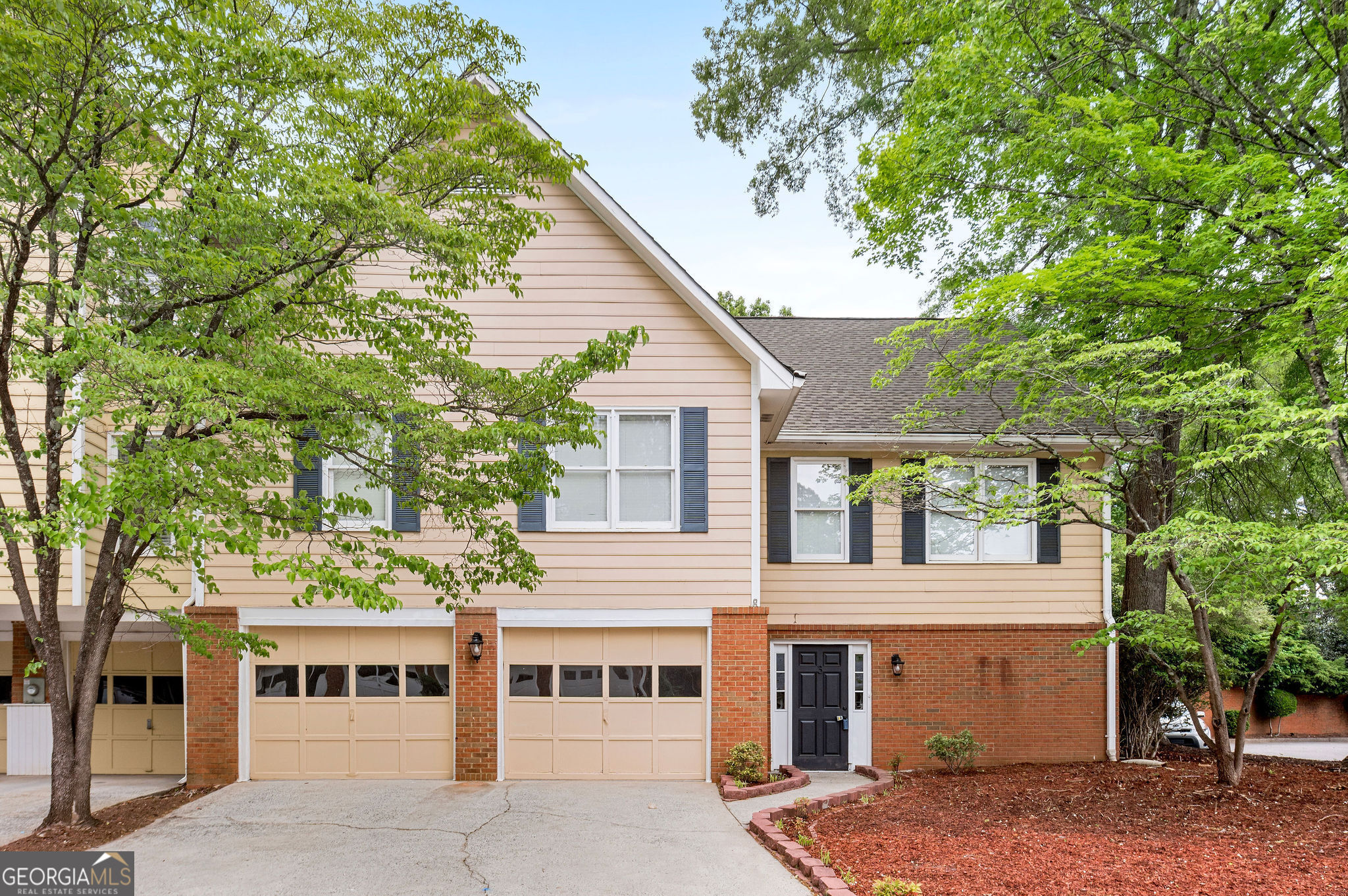 Welcome home to this beautifully renovated townhome located in the prestigious Johns Creek / Alpharetta area within the Riversong subdivision. This 3 bedroom 2 bathroom "end unit" home boasts an open floorplan with new upgrades including fresh paint (both interior and exterior), a new garage ceramic coated floor, new light fixtures throughout, remodeled kitchen and bathrooms, new window and door hardware, new doorbell, new carpet, landscaping, and so much more! This unit is situated on the end with a large front and backyard that is beautifully landscaped and allows a ton of natural sunlight. Additionally there is a large 2 car garage that is deep enough to fit a third car! The owner's suite has a renovated master bathroom with a huge double vanity and a tiled walk-in shower. There are oversized second and third bedrooms, a large living room, and fireplace. There is a craft/utility room on the main level that could easily be converted into a third bathroom / kitchen area. The owners have received a quote for this work and part of it may be negotiable in the offer. The quote has been loaded with the home documents. Rentals are allowed, so all investors are welcome! Sellers are motivated! Excellent location close to 400 and 141, with tons of nearby grocery stores, restaurants, shopping, schools, and more.
