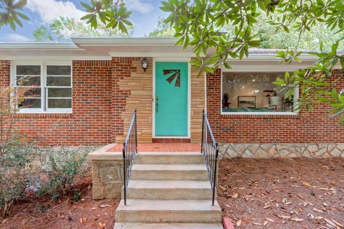 Custom built in 1954, this stylish 3 bedroom & 2 bath home is a mid-century modern brick house build on top of a spacious granite 2 car garage and basement space. Sited on a lovely lot, this property is loaded with curb appeal, with plenty of space for families, dog lovers, and entertainers. Wonderful neighbors nearby, including the new Skyhaven Quarry development in the canyons about 1/4 mile south. The kitchen and bathrooms are updated; the walls, floors, ceilings and lighting are updated. The finishes are fresh & gleaming!!