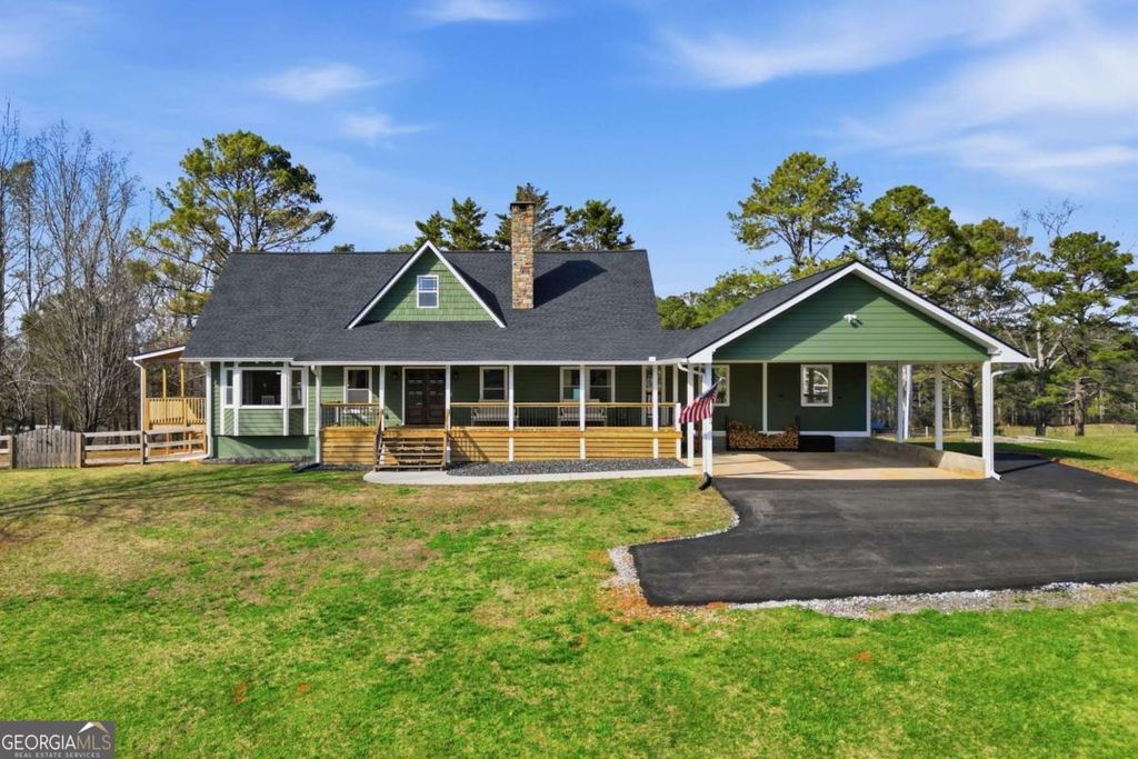 Photo of 858 Honeysuckle Lane, Temple, GA 30179 (MLS # 10705569)