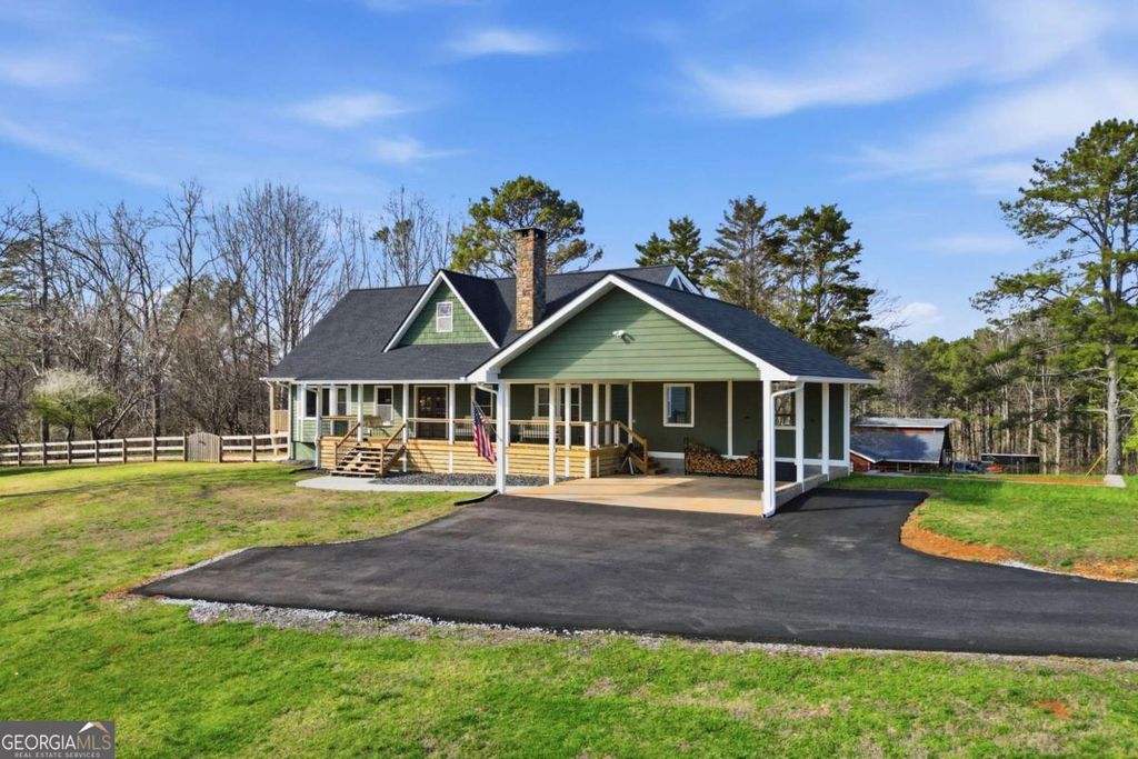 Photo of 858 Honeysuckle Lane, Temple, GA 30179 (MLS # 10705569)