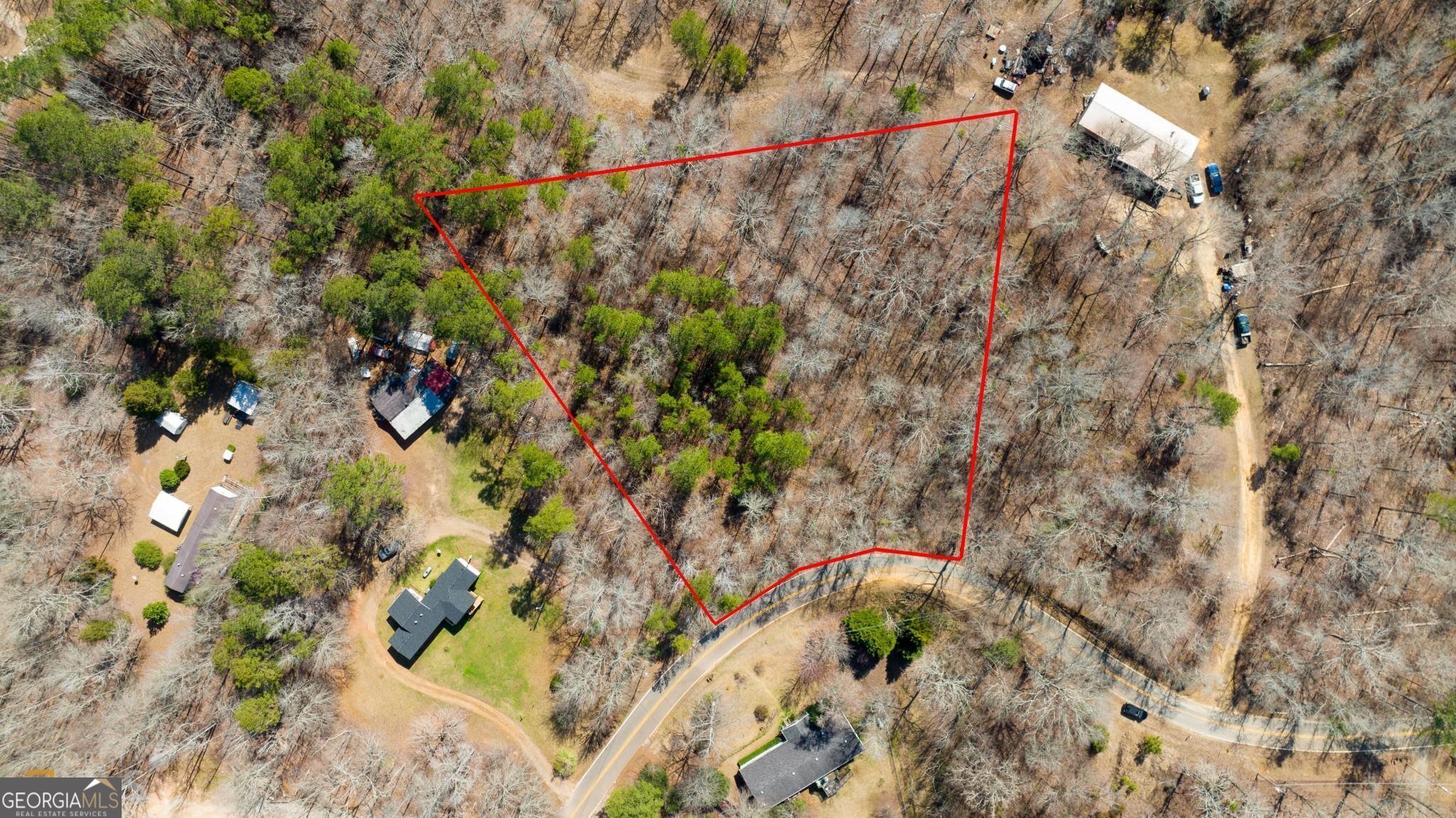 Beautiful 1.55 acres in Putnam county across the street from Lake Sinclair. Twilight Shores is a quiet and peaceful neighborhood that is the perfect spot to build your forever home in Georgia. The beautiful hardwood trees provide a natural canopy of shade and privacy. The topography is gently rolling and ideal for a building site. The property's depth will allow the new owner to hide a home away from the street to create a very private residence. Don't miss out on this great opportunity!