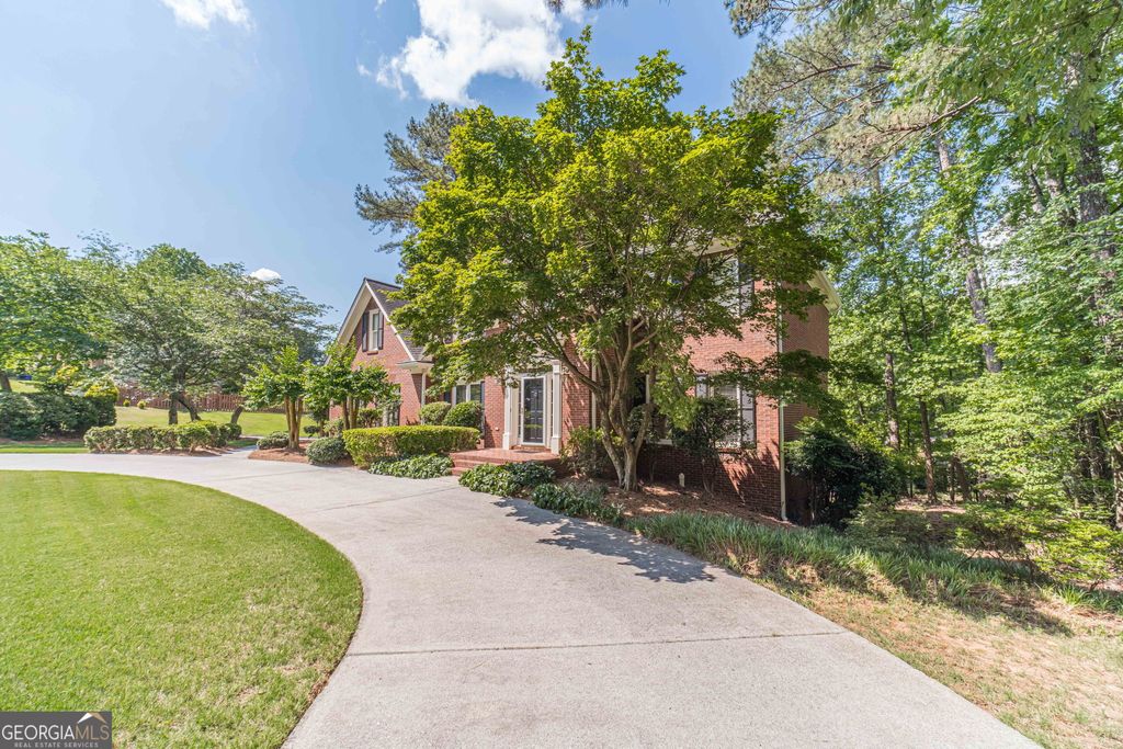 Photo of 387 Coopers Pond Drive, Lawrenceville, GA 30044 (MLS # 10769399)