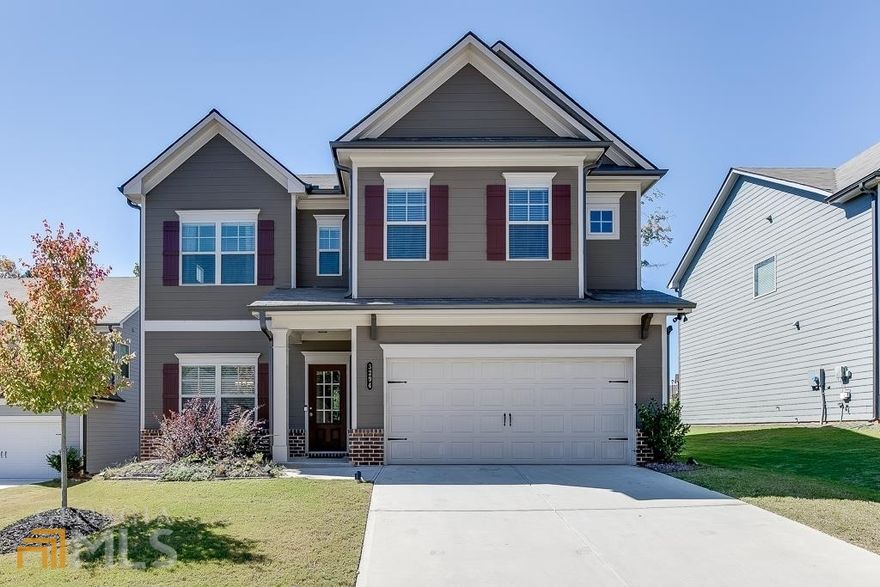 PRICE IMPROVEMENT!! Amazing location for a beautiful home! This 4 bedroom & 2.5 bath newly built home in Creekside at Mulberry Park has everything you are looking for including many builder upgrades! Open concept living allows for perfect hosting & entertaining flow. Elegant coffered ceilings & fireplace in living room. Oversized windows allow lots of natural light and view to the back yard with wooded privacy. Enjoy morning coffee on your covered patio with a privacy wall. The oversized kitchen island, stainless steel appliances, walk-in pantry, spacious eat-in area round out this fabulous kitchen. 1/2 bath on main level for convenience to guests. Hang your bags & coats in the convenient mudroom off of the garage. Second level features an expansive primary bedroom w/ luxurious en-suite bath including high ceilings, upgraded tile and a 7' shower! Large walk-in closet offers ample room for clothes, shoes & storage. This level also includes three more bedrooms w/ walk-in closets, spacious full bath & laundry room. Home is located in cul-de-sac and in close proximity to the community pool. Enjoy a nature walk through the trails in the neighborhood along Mulberry River or have a picnic in the greenspace! Home is conveniently located near Northeast GA Medical Center, Chateau Elan, grocery stores, restaurants, shopping, access to I-85 & so much more!