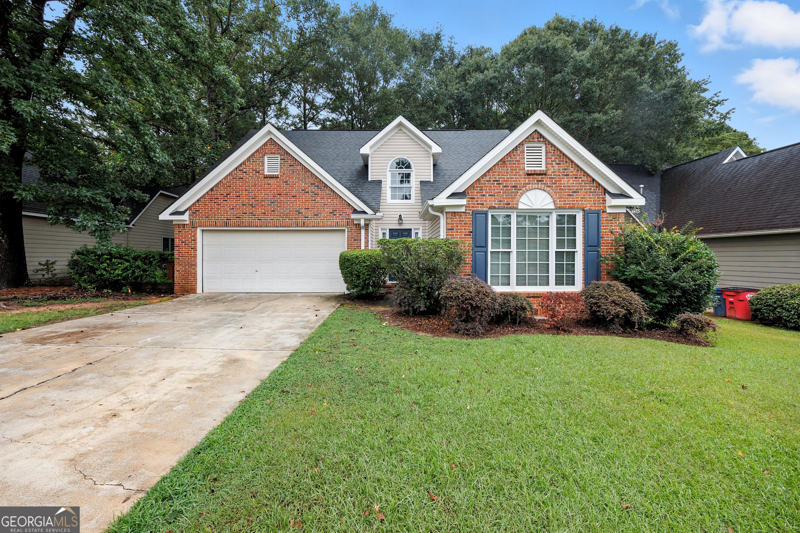 Welcome to this beautiful 3-bedroom, 2.5-bathroom home that features a bonus room, ideal for a home office, playroom, or extra living area. From the moment you step inside, you're greeted by tall ceilings and a striking statement staircase that adds character and charm. Nestled in a quiet North Macon neighborhood. With 2,102 square feet of living space on a quarter acre lot, this property offers the perfect blend of space, comfort, and convenience. Imagine coming home after a long day, entering into your spacious two car garage and making your way into the kitchen where you'll enjoy wooded views (no back yard neighbors) right from the kitchen sink window. With a spacious back porch, this home offers a space to relax, the perfect spot to sip your morning coffee or unwind in the evening! The exterior is in pristine condition and inside, the home is move in ready with great potential to make it your own. While already comfortable and functional, a few cosmetic updates would easily transform the space to fit your personal style. Several updates have already been done in recent years, giving you a great head start! Located just minutes from shops, dining, and all that North Macon has to offer, this home is a must see! Schedule your private showing today!