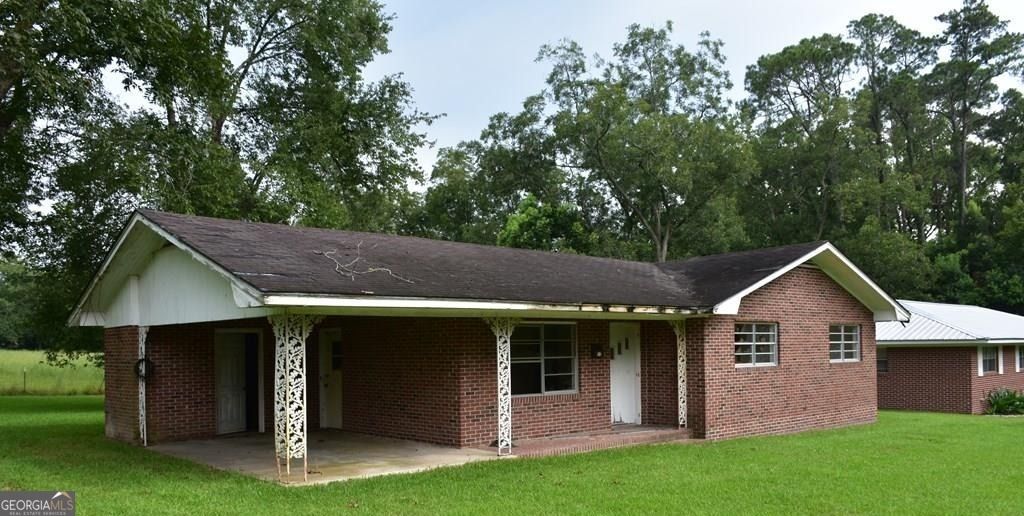 Photo of 305 S BAKER Street, Glennville, GA 30427 (MLS # 10692646)