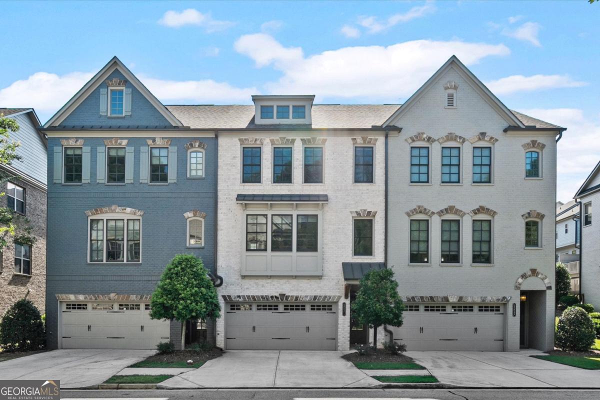 LOCATION, LOCATION, LOCATION!! Welcome to Skyland Brookhaven! Like-new, 3+ bedroom, 3 bath townhome located in the heart of Brookhaven. Flooded with natural light, the main floor boasts 3 1/4" solid oak hardwood flooring, a gourmet chef's kitchen with stainless steel appliances, gas range, custom vent hood, timeless subway tiles for the backsplash, shaker style cabinets, and an enormous island. The beautiful open concept layout makes entertaining effortless and adds a modern flair; a half bath, coat closet, and walk-in pantry are conveniently located at the top of the stairs. With a shiplapped accent wall, built-in bookshelves, gas fireplace and coffered ceilings, the living room exudes warmth and invitation. Step out onto the oversized deck, perfect for entertaining, grilling, or to just enjoy a bit of the outdoors. Upstairs, you'll find the primary suite featuring a double tray ceiling, custom walk-in closets, and a generous en-suite bathroom equipped with quartz countertops, a soaking tub and a separate shower. Two secondary bedrooms are perfectly suited for an office or guest room and they share a well-appointed bathroom. The laundry room includes dual cabinet storage. On the lower level, you are greeted by a spacious terrace level that makes for endless opportunities. As it is, the space can easily serve as multiple rooms in one: Office, gym, theater room, etc. If a fourth bedroom is desired, a wall could easily be put in to separate the space as there is a full bathroom as well. Skyland Brookhaven offers a resort-style saltwater pool, clubhouse, dog park, and fitness center with a cycle bar within the community. An adjacent park offers a playground, scenic walking trails, picnic tables and sand volleyball courts. Just minutes from everything you need- Nightlife, Groceries, Recreation, Doctors, and easy access to I-75/I-85! Enjoy the Outdoors at Skyland Park, Brookhaven Park, PDK Park, or browse fresh finds at the Brookhaven Farmers Market on Dresden. So many choices, all just around the corner! Just 15 minutes to downtown, 25 minutes to the airport, the location simply cannot be beat! THIS WON'T LAST LONG!