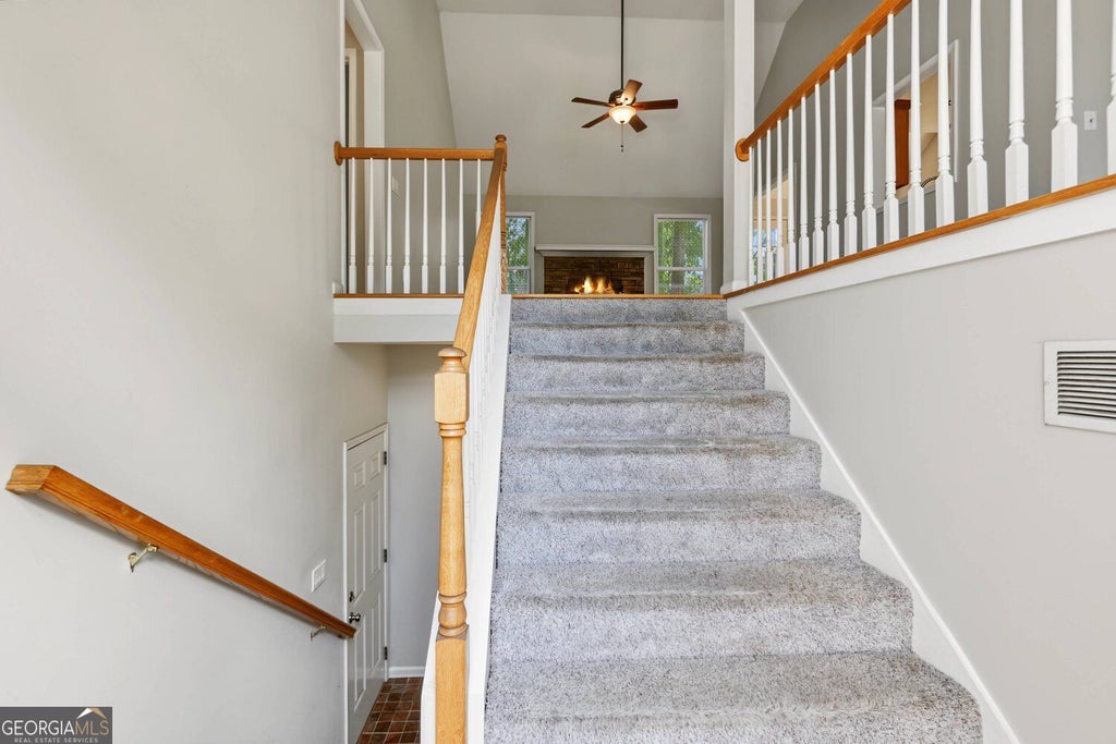 Photo of 5360 Otter Creek Run Run, Cumming, GA 30040 (MLS # 10851238)
