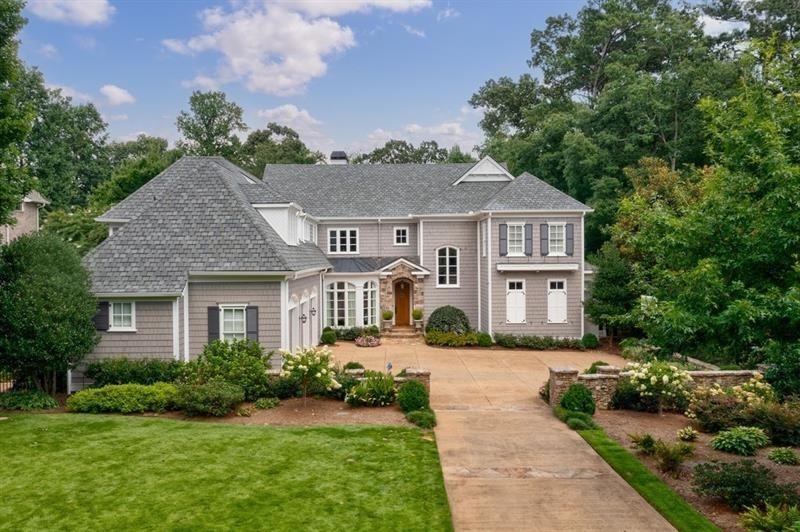 Superb design & the latest luxuries distinguish this stunning gated estate near Chastain Park. Impressive interior features formal and informal living spaces, an exceptional kitchen open to the family room, formal dining room with butler's pantry and bar. Sought-after master suite on main hosts newly updated bath. Upper level hosts 5 spacious bedrooms and 4 bathrooms. Exterior entertaining spaces include screened, dining porch with outdoor kitchen, covered porch with fireplace overlooking lush, private rear yard with amazing pool. 3 car attached garage with parking pad. This beautiful home has been meticulously maintained by the current owners, updates include newly added generator, new roof, new gutters, new hot water heater etc.
