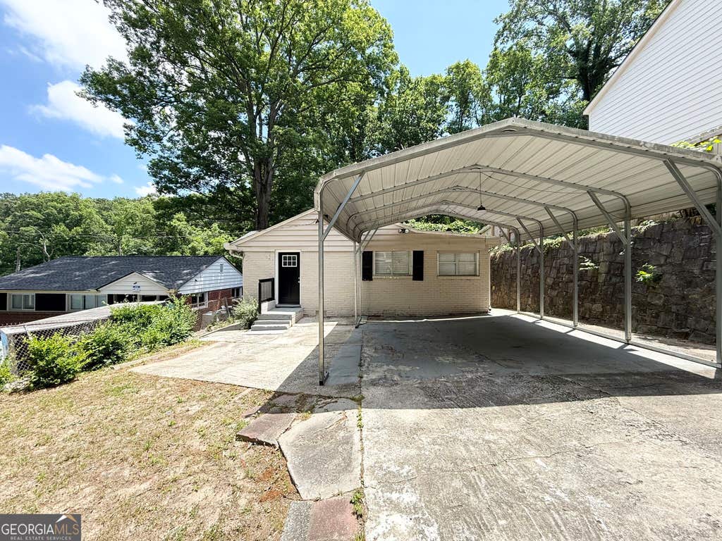 Photo of 939 N Eugenia Place NW, Atlanta, GA 30318 (MLS # 10830245)
