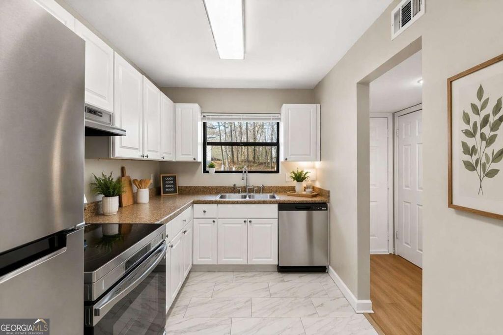 Photo of 3837 Moran Way #C, Peachtree Corners, GA 30092 (MLS # 10738033)