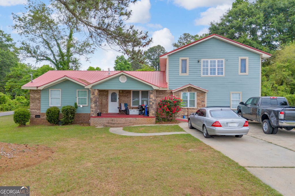 Photo of 105 Wilson Street, Greensboro, GA 30642 (MLS # 10763456)
