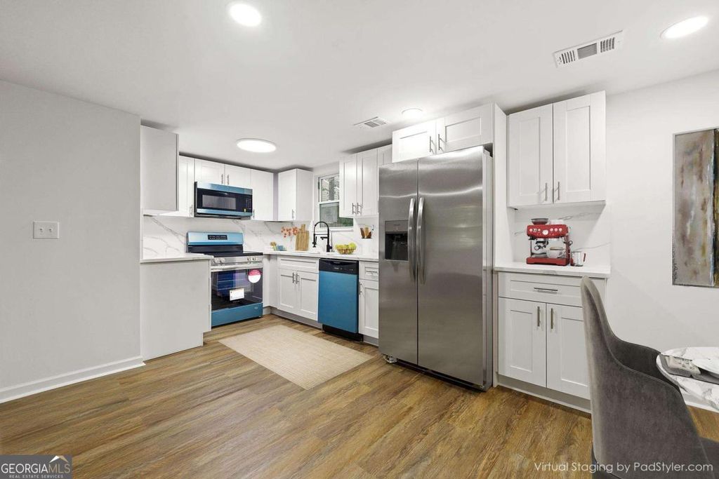 Photo of 5025 Martins Crossing Road, Stone Mountain, GA 30088 (MLS # 10668123)