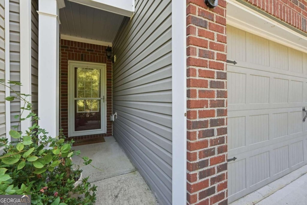Photo of 1250 Rubble Road, Cumming, GA 30040 (MLS # 10841790)