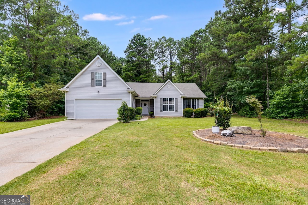 Welcome to this beautifully updated 3-bedroom, 2-bathroom home nestled on a spacious 1.18-acre lot, and features a large bonus room perfect for a home office, playroom, or extra living space. Step inside to discover a recently renovated kitchen featuring brand-new cabinets, sleek countertops, modern appliances, and fresh flooring. Perfect for everyday living and entertaining. Fresh paint throughout the interior gives the home a clean, modern feel. Outside, enjoy the expansive yard with plenty of space for gardening, recreation, or future additions. Don't miss this move-in ready gem! Schedule your private showing today!