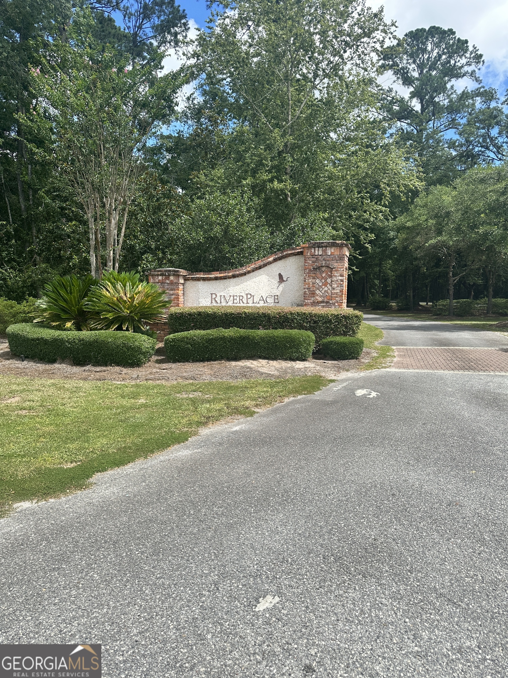Nestled within the exclusive gated community of River Place Plantation, this .71-acre wooded lot offers the perfect blend of privacy and natural beauty. Surrounded by mature trees and serene marsh views, this buildable homesite provides a unique opportunity to create a custom retreat in one of the area's most sought-after coastal neighborhoods. Residents of River Place Plantation enjoy resort-style amenities, including a charming clubhouse with a screened-in gathering area, cozy fireplace, and a sparkling pool that overlooks the tranquil marsh. Boaters and water lovers will appreciate the deep-water community dock with floating day dock access, offering easy entry to the river and beyond. Whether you're seeking a peaceful primary residence or a vacation getaway, this property delivers an idyllic Lowcountry lifestyle. Don't miss your chance to own a slice of paradise!