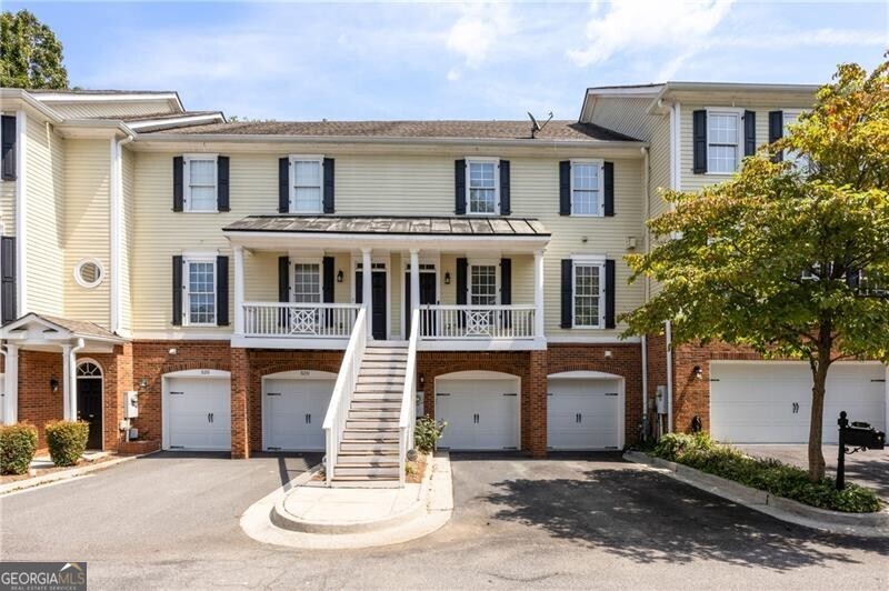 INCREDIBLE TOWNHOME IN THE HEART OF DOWNTOWN ROSWELL! Stroll to shops, restaurants, Roswell Square, and endless trails right from your doorstep. This pristine home enjoys a rare setting overlooking the Chattahoochee National Forest Park and Vickery Creek, with the Roswell Mill and walking trails directly behind the property. The welcoming entry foyer opens to a fireside great room with custom built-in bookcases, flowing seamlessly into the formal dining room. Architectural archways define the main level, while the chef's kitchen anchors the rear of the home with white cabinetry, quartzite countertops, stainless steel appliances, and a spacious breakfast/sitting area-all enjoying views of the lush rear grounds and creek. Step out to the tranquil covered patio, the perfect spot to enjoy morning sunrises or unwind at day's end. Hardwood flooring throughout main level. A convenient half bath completes the main level. Upstairs, the primary suite is a true retreat with trey ceiling, hardwood floors, a wall of windows framing the natural views, and a spa-like bath with vaulted ceiling, double vanities, jetted soaking tub, and separate shower. The suite also features a generous custom closet. Two additional large bedrooms share a full bath, and the laundry room is ideally located upstairs. The finished terrace level offers flexibility with a large bonus room that could serve as a 4th bedroom, media room, or secondary family room, plus a full bath and an additional covered deck overlooking the serene rear landscape. Community upkeep is a breeze-exterior painting is scheduled within the next 2-3 months and covered by the HOA.