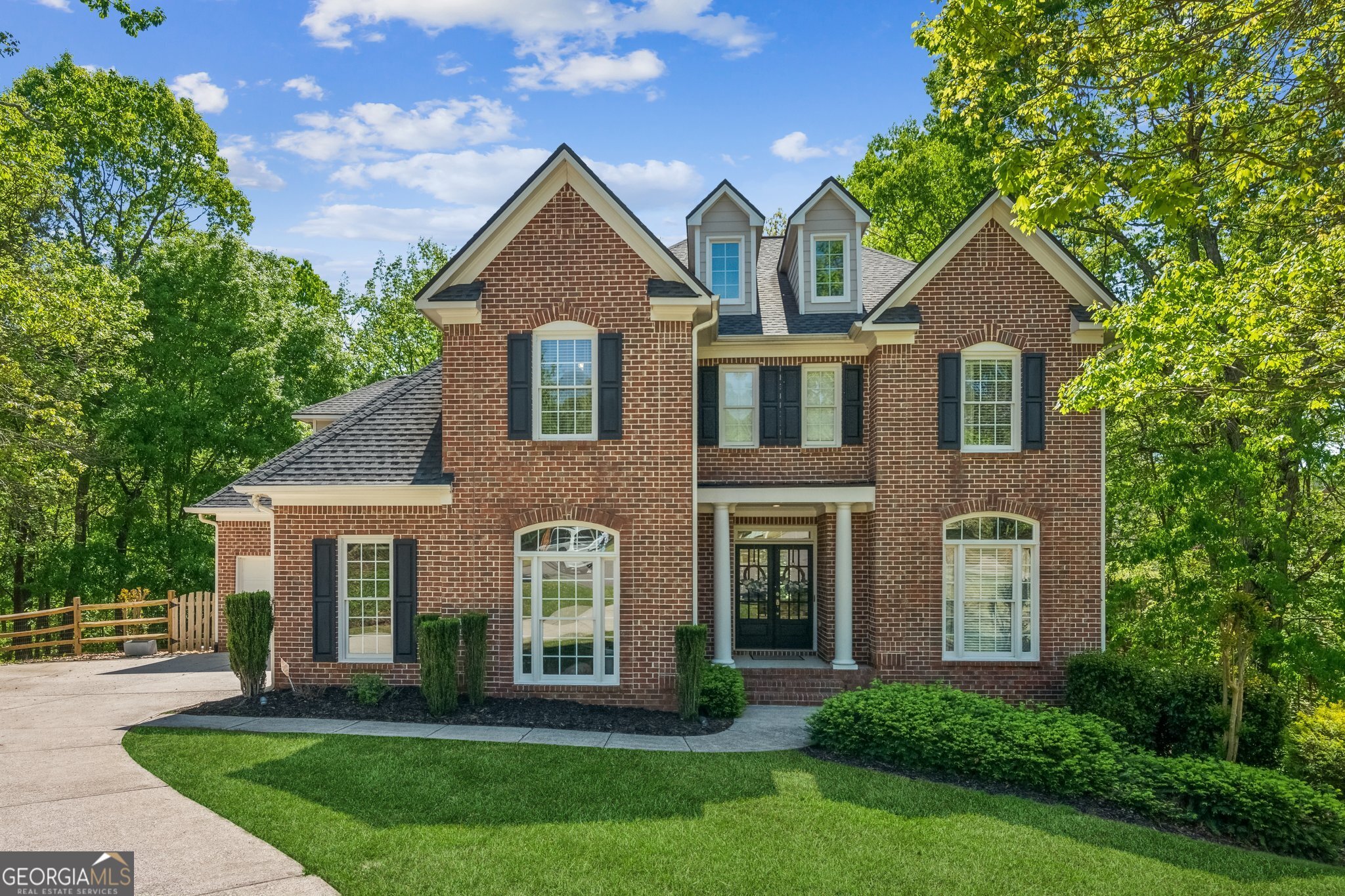 *A CERTIFIED 5-STAR Home! Priced below a recent 2025 Appraisal, Pre-Inspected, 2-10 Home Warranty included, Termite Warranty included. Welcome to Chattahoochee River Club - one of metro Atlanta's most desirable swim/tennis communities along the Chattahoochee River! This 6-Bedroom home sits on nearly 2 acres in a private cul-de-sac. Features a true In-Law Suite with a Full 2nd Kitchen in Terrace Level. An updated open kitchen with granite countertops and stainless-steel appliances anchors the main level. The kitchen area opens to a gorgeous fireside family room & breakfast room. From there, step out to the large deck overlooking the fenced backyard and your own nature preserve. A separate formal dining room, living room, and bedroom complete the main level. Gorgeous hardwood floors and fresh paint throughout. Upstairs, you'll find a generous Master Suite & Retreat, spa-like bathroom, and double closets + three more bedrooms. The finished terrace level offers a Rec Room, 2nd kitchen, and would be an awesome In-Law Suite or Teen Suite. It's perfect for both relaxing and entertaining. The Chattahoochee River Club community offers amazing amenities like nature trails along the Chattahoochee River, a Clubhouse with a fitness center, a playground, a baseball field, an Olympic pool with a swim team, a separate leisure pool, tennis courts & basketball courts. Pickleball is coming soon. Walk or Golf cart to award-winning schools! Minutes away from shopping, restaurants, Lake Lanier, Bowman's Island, Habersham Marina, GA-400, & so much more. Schedule your private tour today!