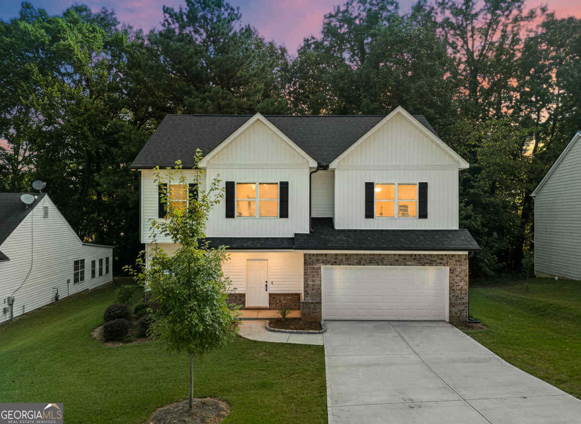 Like-New Home Built in 2023! - Prime location just minutes from I-85, Sugarloaf Mills Mall, and major shopping/dining. This 4BR/3.5BA beauty offers a modern open floor plan with LVP flooring throughout the main areas and carpet only in the bedrooms. Main level features a flex room that can easily convert into a 5th bedroom, a spacious kitchen flowing seamlessly into the living room, and a convenient half bath. Upstairs, you'll find a loft area, a Jack & Jill bath connecting 2 bedrooms, and an oversized master suite with plenty of space to relax. Enjoy privacy with the fenced backyard-perfect for family gatherings or pets. With its central location and like-new condition, this home is move-in ready and won't last long!