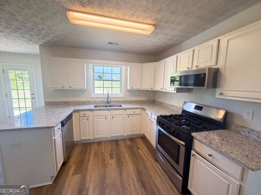 Photo of 705 Windsor Brook Lane, Lawrenceville, GA 30045 (MLS # 10737125)