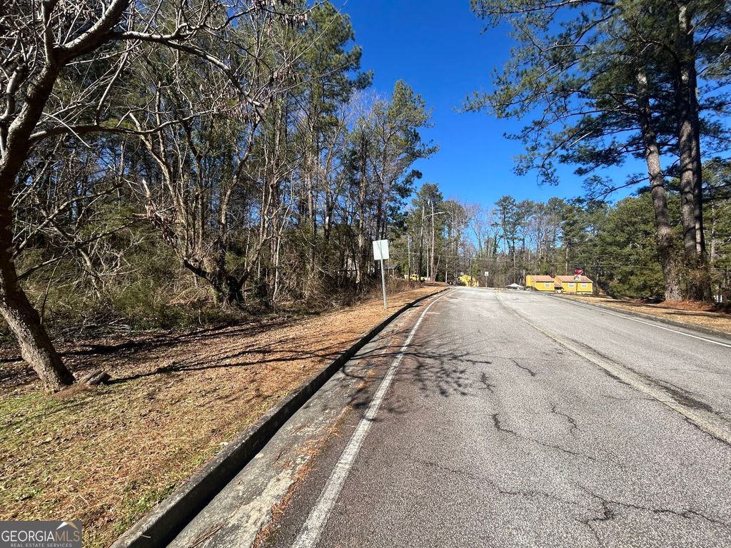 Photo of 7840 Horseshoe Bend, Lithonia, GA 30058 (MLS # 10692582)