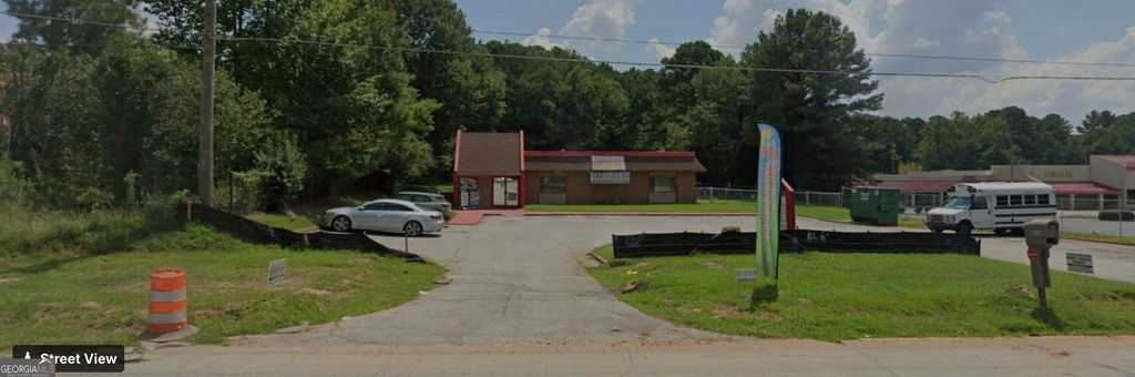 Photo of 8468 Highway 85, Jonesboro, GA 30238 (MLS # 10727724)