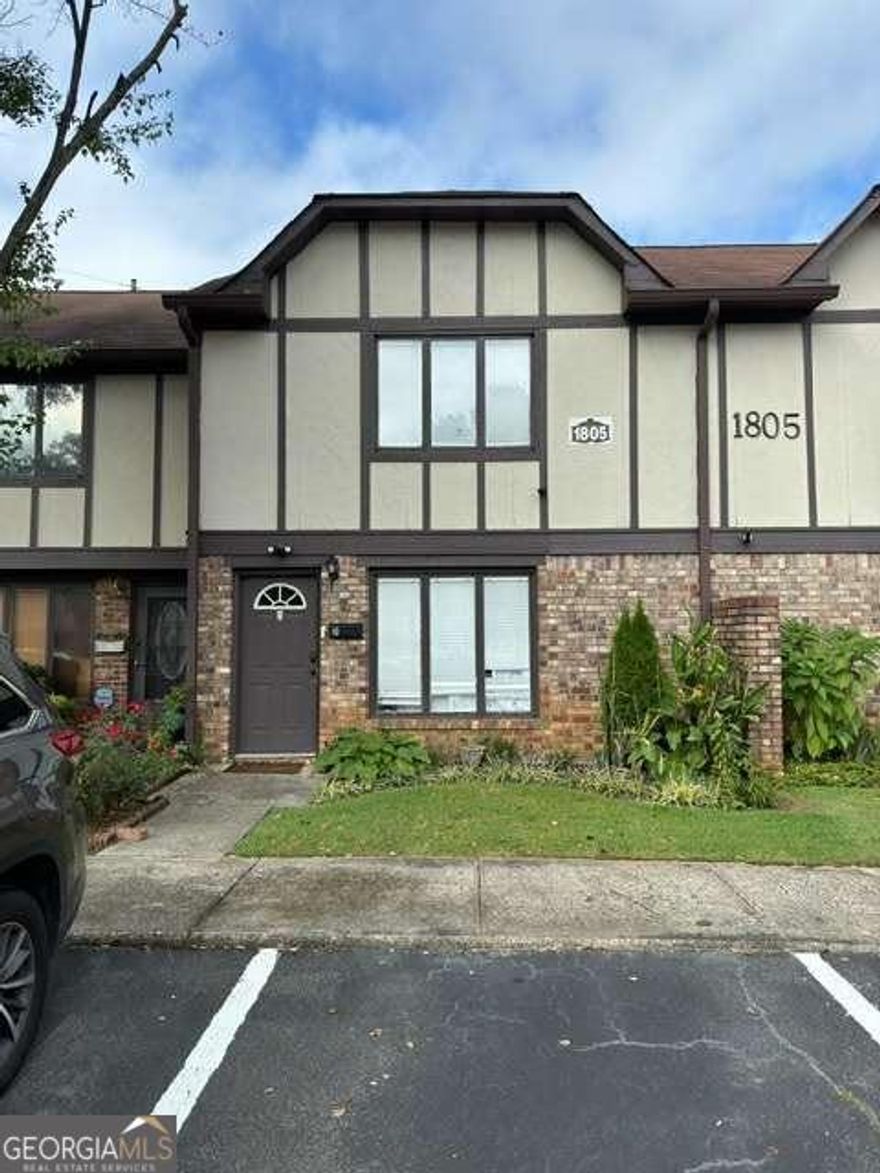 Welcome to Ashborough Village! Located in the heart of Marietta, this Unit boasts lots of features including updated bathrooms, new flooring, a fenced backyard, a concrete patio, spacious Bedrooms, updated kitchen with stainless steel appliances. Living room with lots of natural light, Laundry, and half bath on the main floor. Two bedrooms and a large, updated Bathroom on the second floor. The community boasts tennis courts, a playground, and a pool. This is a convenient location to shops and restaurants at Truist Park, Cumberland, and Marietta Square. Easy access to I-285 and I-75. Schedule your showing today!
