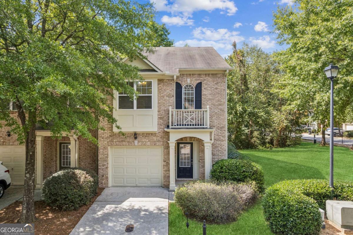 NO RENT RESTRICTION in this GATED community with walking distance to shopping, dining and very close to i85. Very low HOA only $200/month includes water and trash pick up, make this private end unit more affordable for anyone or as an amazing rental investment property located less than a mile from hotels near by! This well-maintained and ready to move in, spacious townhome located in the sought-after gated community of The Gates of Crestwood features an open floor plan, updated kitchen with granite countertops, and stainless steel appliances, fridge is brand new. All 3 bedrooms are upstairs. Enjoy large primary bedroom with huge walk in closet. Brand new LVP flooring on main floor and upstairs, brand new carpet on stairs and whole unit was freshly painted inside and outside. Water heater is also new. AND Beautiful lake just few steps from property and paved walking trail. Don't miss this incredible opportunity for peace and privacy in Duluth. It won't last long! Text listing agent Jarka Baranowski to get a gate code for his Saturday 9/20 from 1-3pm.