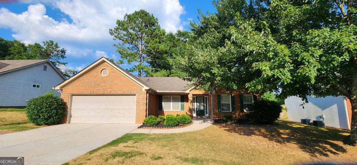 Welcome to this move-in ready 3-bed,2-bath front brick ranch in the heart of Jefferson. Two car garage. The home has been recently pressure washed and freshly painted, giving it crisp appeal. Inside, you'll find a welcoming foyer that leads into an open, light-filled layout upgraded stained cabinets, laminate countertops, kitchen with a view to family room, recently replaced microwave and dishwasher, vinyl flooring throughout the main living areas. Recently replaced water heater (installed June 2024). The spacious master suite features a large sitting area perfect for a home office or reading nook. The master bathroom offers a relaxing soaking tub, double vanity, and ample space to unwind. Down the hall you have two extra bedrooms that share a bathroom. Don't miss this opportunity to own a blend of comfort and convenience in a desirable location. Highly rated Jefferson City School District. Large, fenced, private backyard. Excellent location, close to grocery stores, restaurants, parks, and recreational facilities. Plus, you're just about 30 minutes from Athens, GA-perfect for commuting or enjoying the vibrant college town scene.